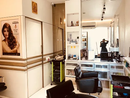 The Box Salon — reception and styling area with backwash station